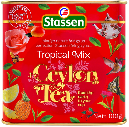 Etykieta herbaty Stassen Tropical Mix z motywami owoców i kwiatów.