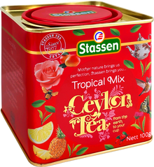 Skośny kadr puszki herbaty Stassen Tropical Mix z dekoracyjnym tłem.