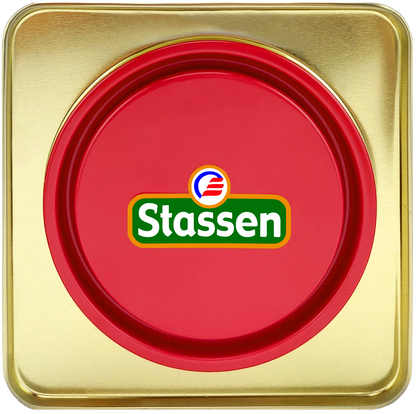 Czerwone wieczko puszki herbaty Stassen Tropical Mix z logo producenta.