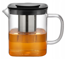 Szklany zaparzacz 1000 ml wypełniony herbatą z metalowym zaparzaczem w środku.