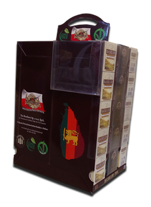 Widok z boku na stand Basilur Tea z logo i certyfikatami GMO Free oraz Vegan OK