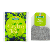 Opakowanie herbaty Stassen Apple Tea w zielono-czarnym designie z motywami roślinnymi.