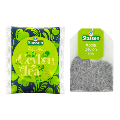 Opakowanie herbaty Stassen Apple Tea w zielono-czarnym designie z motywami roślinnymi.