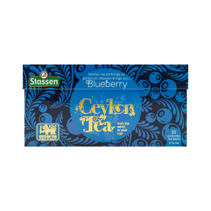 Widok z góry na pudełko herbaty Stassen Blueberry Tea w granatowej tonacji.