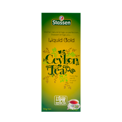 Opakowanie herbaty Stassen Liquid Gold Tea z filiżanką naparu – aromatyczna herbata cejlońska.