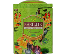Herbata Basilur Green Freshness w ozdobnej zielonej puszce z kwiatowym wzorem.
