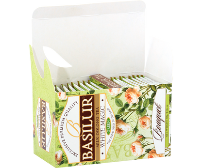 Otwarte pudełko Basilur White Magic ukazujące foliowane saszetki herbaty oolong.