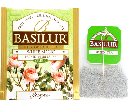 Saszetka herbaty Basilur White Magic oraz torebka z listkami oolong – herbata zielona o mlecznym aromacie.