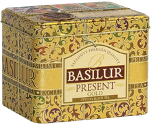 Herbata Basilur Present Gold w złotej puszce widziana z lewej strony