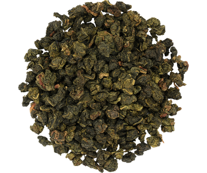 Liście herbaty Basilur Oolong Green Tea – zwinięte, zielono-brązowe oolong.