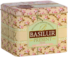 Puszka herbaty Basilur Present Pink ozdobiona motywem róż.