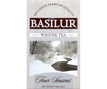 Front opakowania herbaty Basilur Winter Tea Four Seasons z zimowym krajobrazem.