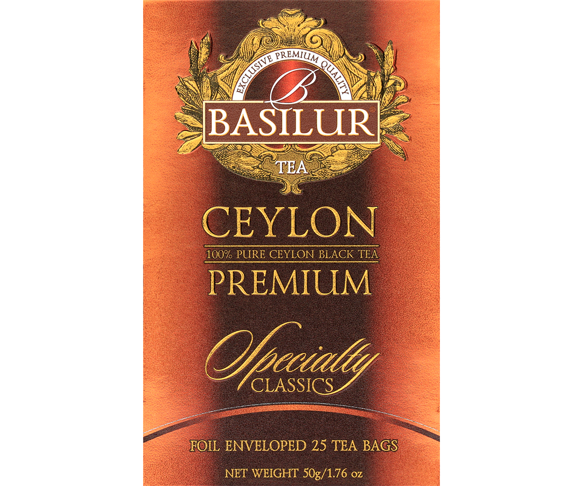 Przód opakowania Basilur Ceylon Premium w pomarańczowo-złotych barwach.