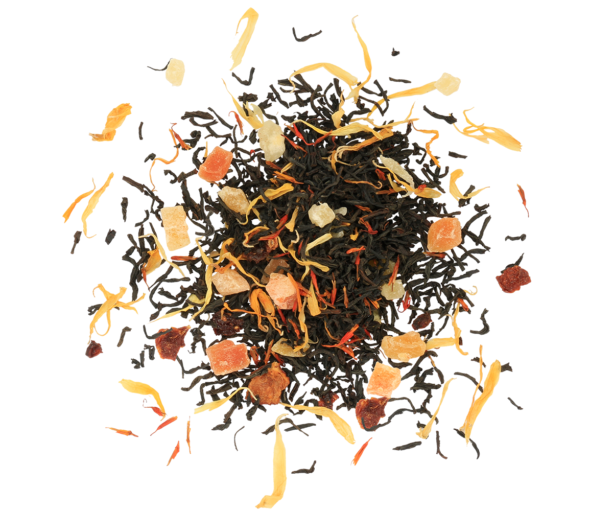 Susz czarnej herbaty Basilur Tea Book vol. II z owocami papai i ananasa w zbliżeniu.