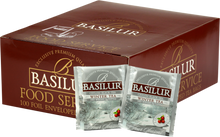 Opakowanie zbiorcze herbaty Basilur Winter Tea 100 x 2 g z torebkami w kopertach, czarna herbata z żurawiną z serii Four Seasons.