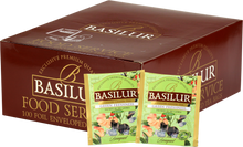 Opakowanie herbaty Basilur Green Freshness z widocznymi saszetkami zielonej herbaty z miętą pieprzową.