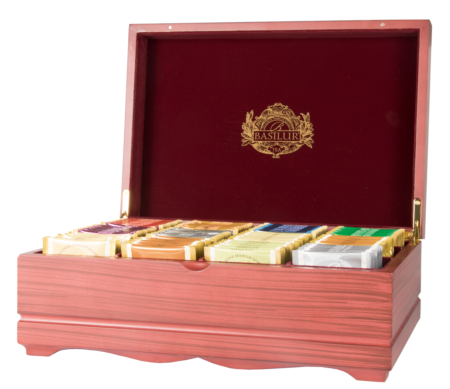 Otwarte drewniane pudełko Basilur z herbatami w saszetkach prezentujące kolekcję dwunastu smaków.
