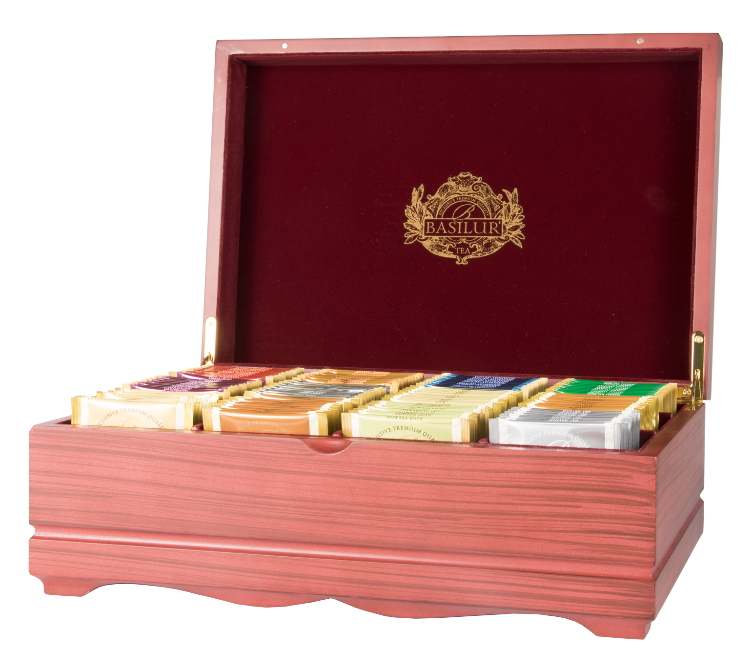 Otwarte drewniane pudełko Basilur z herbatami w saszetkach prezentujące kolekcję dwunastu smaków.

