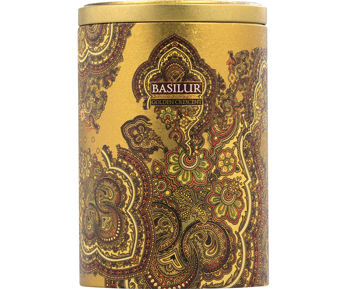 Detal puszki Basilur Golden Crescent z orientalnym wzorem w kolorze złota i zieleni.