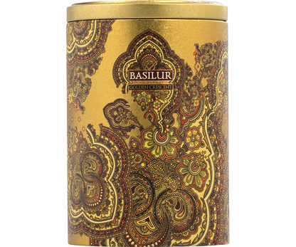 Detal puszki Basilur Golden Crescent z orientalnym wzorem w kolorze złota i zieleni.