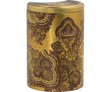 Złota puszka Basilur Golden Crescent widziana z boku z bogatym, orientalnym zdobieniem.