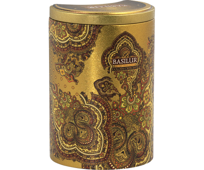 Złota puszka Basilur Golden Crescent widziana z boku z bogatym, orientalnym zdobieniem.