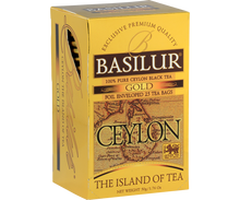 Złote opakowanie herbaty Basilur Gold Ceylon widziane z przodu.