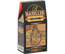 Opakowanie herbaty Basilur Special z mapą Cejlonu na froncie w eleganckiej czarno złotej stylistyce.