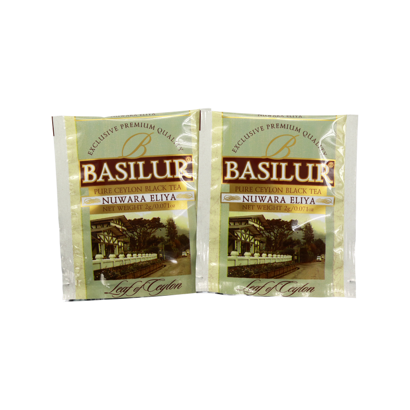 Saszetki w kopertach Basilur Nuwara Eliya – czarna herbata cejlońska w złotych kopertach z krajobrazem Nuwara Eliya.