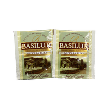 Saszetki w kopertach Basilur Nuwara Eliya – czarna herbata cejlońska w złotych kopertach z krajobrazem Nuwara Eliya.