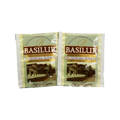 Saszetki w kopertach Basilur Nuwara Eliya – czarna herbata cejlońska w złotych kopertach z krajobrazem Nuwara Eliya.