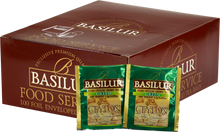 Opakowanie herbaty Basilur Green Ceylon z widocznymi saszetkami zielonej herbaty cejlońskiej.