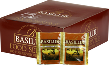 Opakowanie herbaty Basilur Dimbula z widocznymi saszetkami czarnej herbaty cejlońskiej.