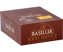 Bok pudełka Basilur Kandy – eleganckie brązowo-złote opakowanie herbaty cejlońskiej.