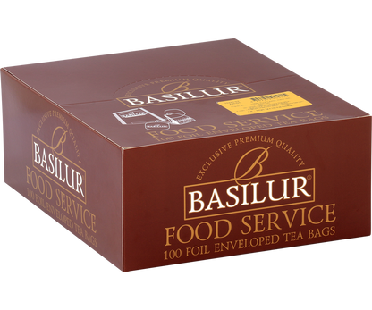 Bok pudełka Basilur Kandy – eleganckie brązowo-złote opakowanie herbaty cejlońskiej.