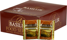 Opakowanie herbaty Basilur Ruhunu z widocznymi saszetkami czarnej herbaty cejlońskiej.