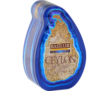 Herbata Basilur High Grown w ozdobnej, metalowej puszce widziana z lewej strony.