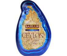 Niebieska puszka Basilur High Grown z mapą Cejlonu na przodzie.