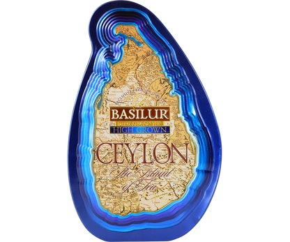 Niebieska puszka Basilur High Grown z mapą Cejlonu na przodzie.