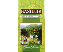 Zielona herbata Basilur Summer Tea – opakowanie z grafiką natury i jeziorem.