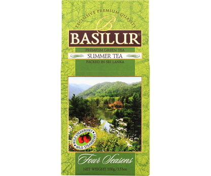 Zielona herbata Basilur Summer Tea – opakowanie z grafiką natury i jeziorem.