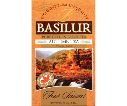 Pudełko herbaty Basilur Autumn Tea z jesiennym krajobrazem na etykiecie.