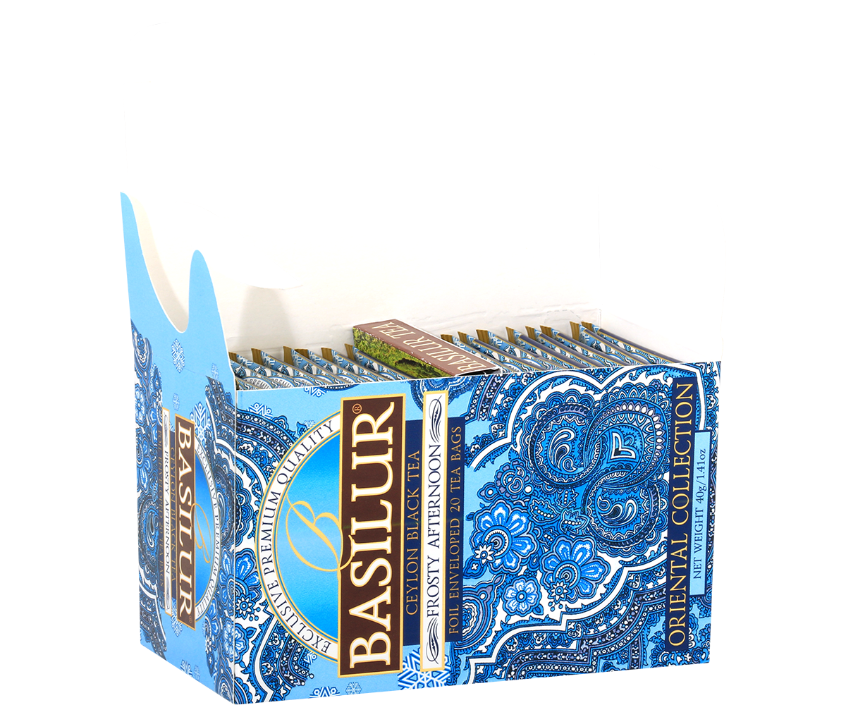 Otwarta herbata Basilur Frosty Afternoon z kopertami w ozdobnym błękitnym pudełku.