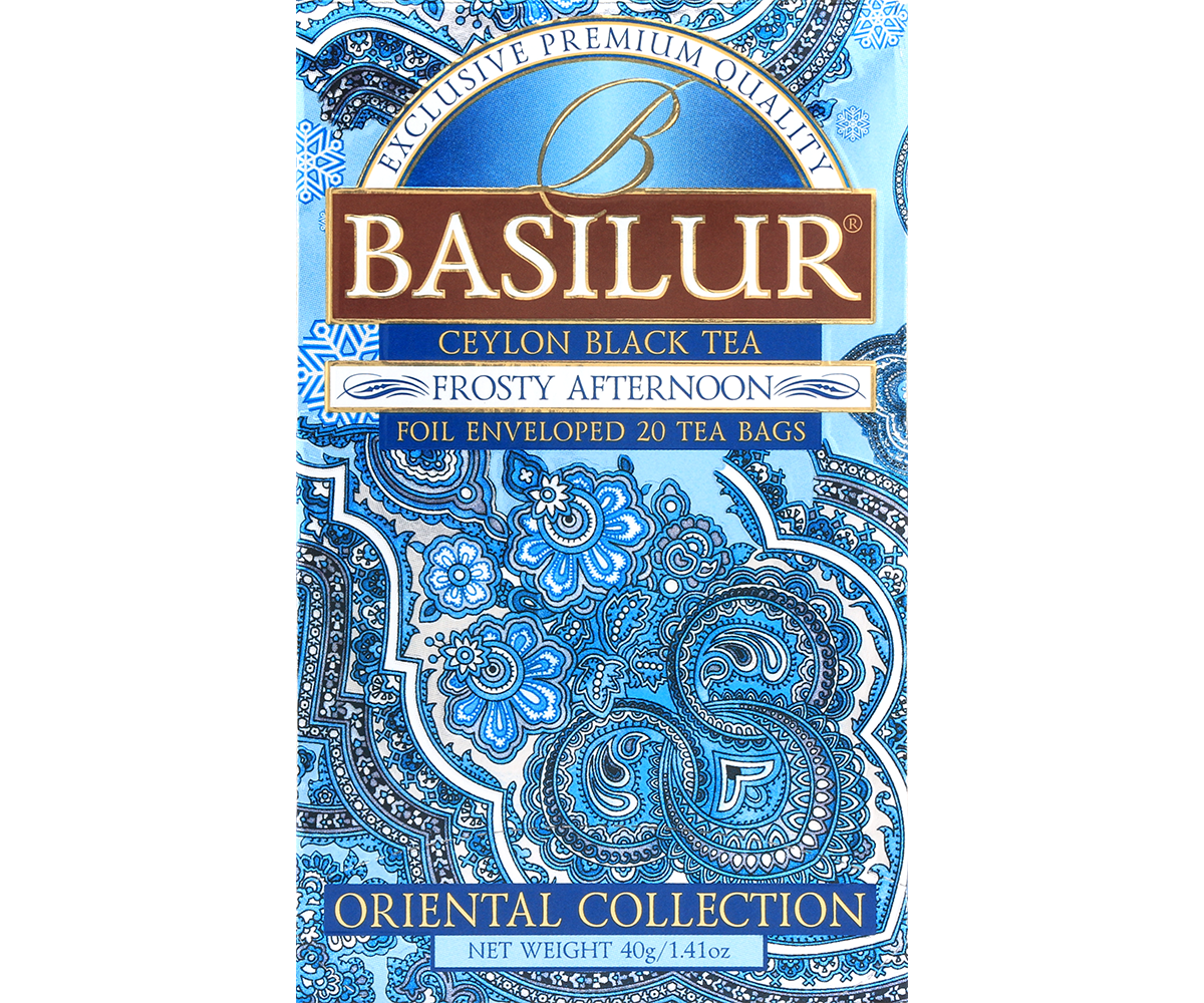 Opakowanie herbaty Basilur Frosty Afternoon w niebieskim, zimowym stylu.