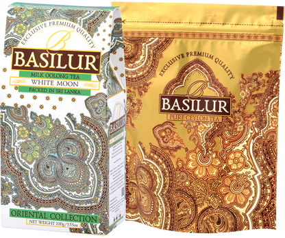 Opakowanie herbaty Basilur White Moon z kolekcji Oriental Collection oraz złoty worek foliowy.