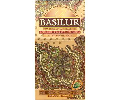 Herbata Basilur Golden Crescent w ozdobnym złotym opakowaniu z orientalnym wzorem.