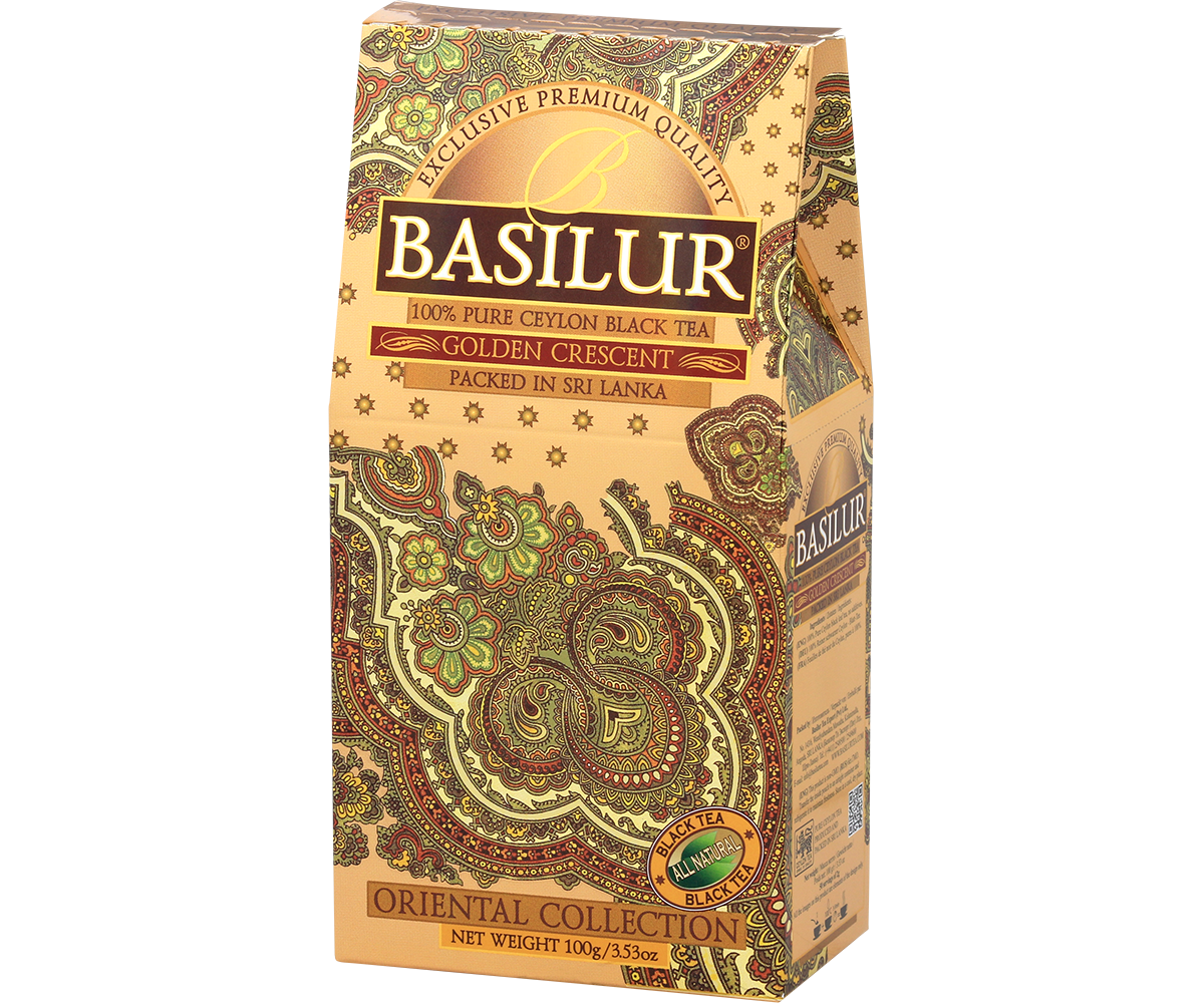 Herbata Basilur Golden Crescent w złotym pudełku z detalami w odcieniach zieleni i czerwieni.