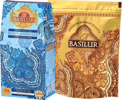 Basilur Frosty Afternoon z dołączonym opakowaniem refill w eleganckiej złoto-niebieskiej stylistyce.
