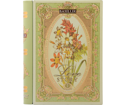 Puszka w kształcie książki Basilur Love Story vol. I z kwiatowym motywem na okładce.