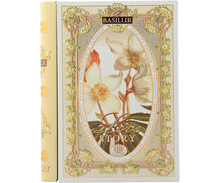 Herbata Basilur Love Story vol. III w eleganckim opakowaniu przypominającym książkę.